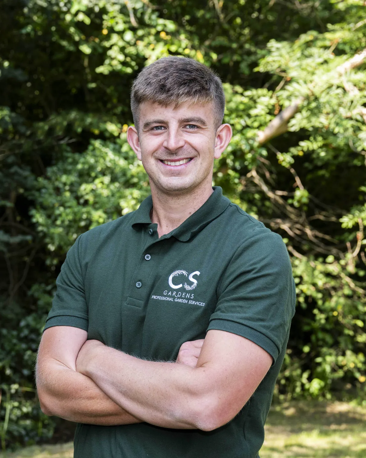 Calogero, founder and owner of CS Services, in a Surrey garden