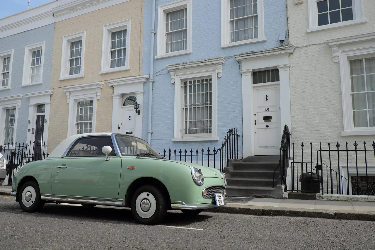 Pastel-painted mews houses in Notting Hill, London
