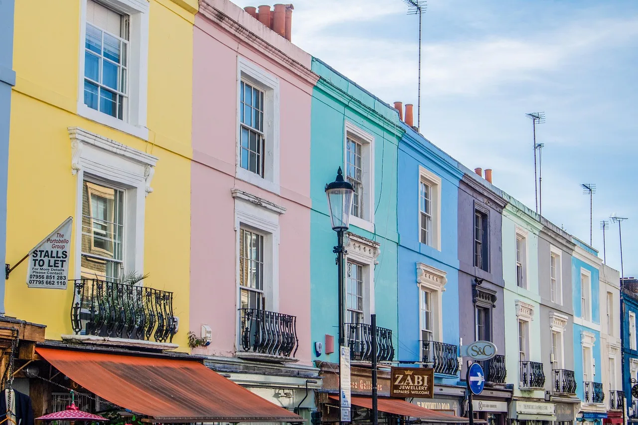 Colourful terraced shopfronts on Portobello Road near Ladbroke Grove